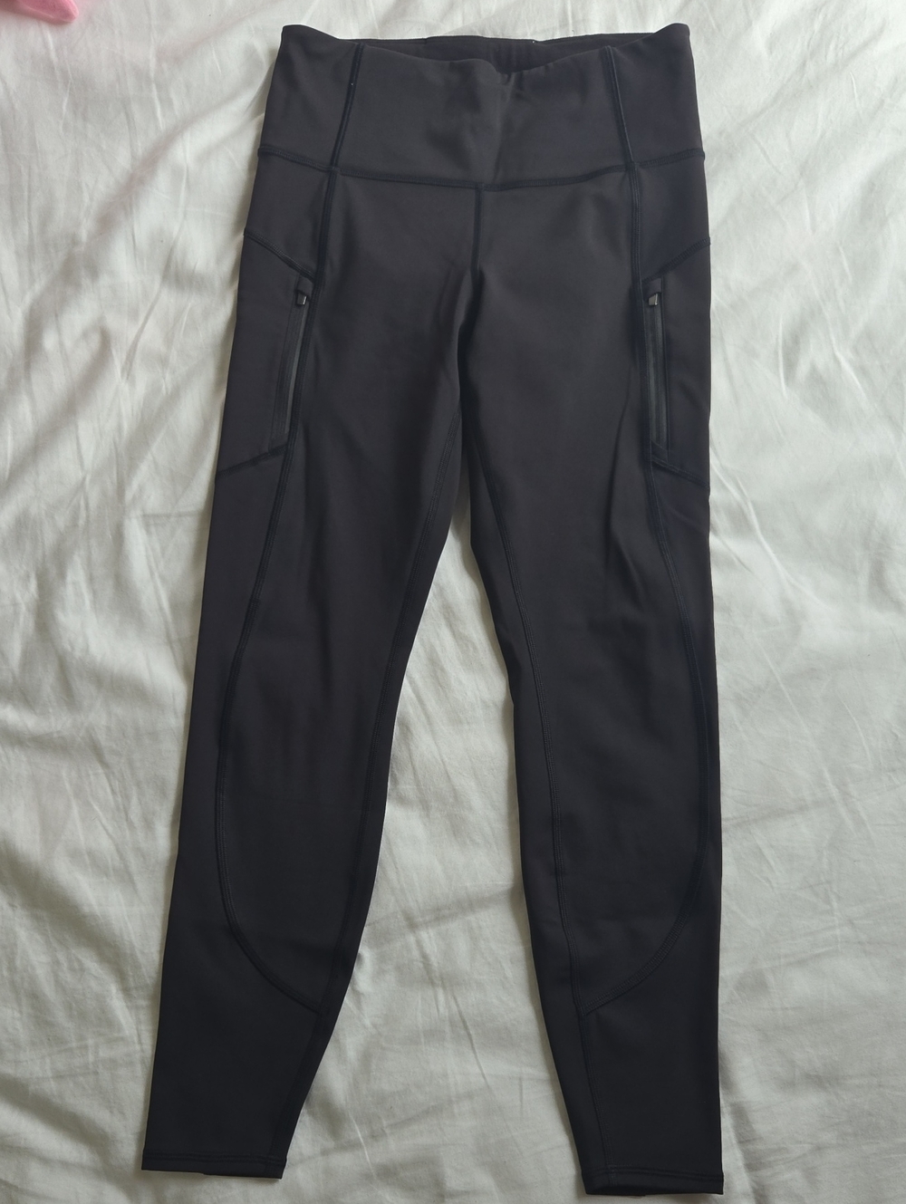 Athleta Black High-Rise Performance Leggings with Zippered Side Pockets